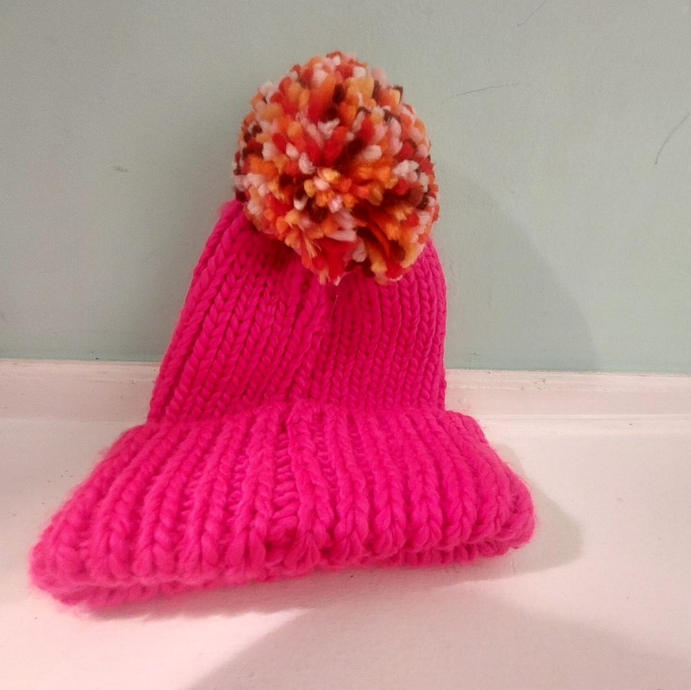 Wool knit hat with a pom pom